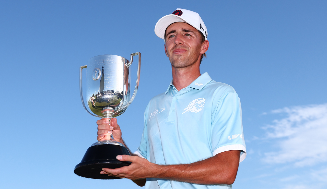 David Puig hods the BMW Australian PGA Championship trophy